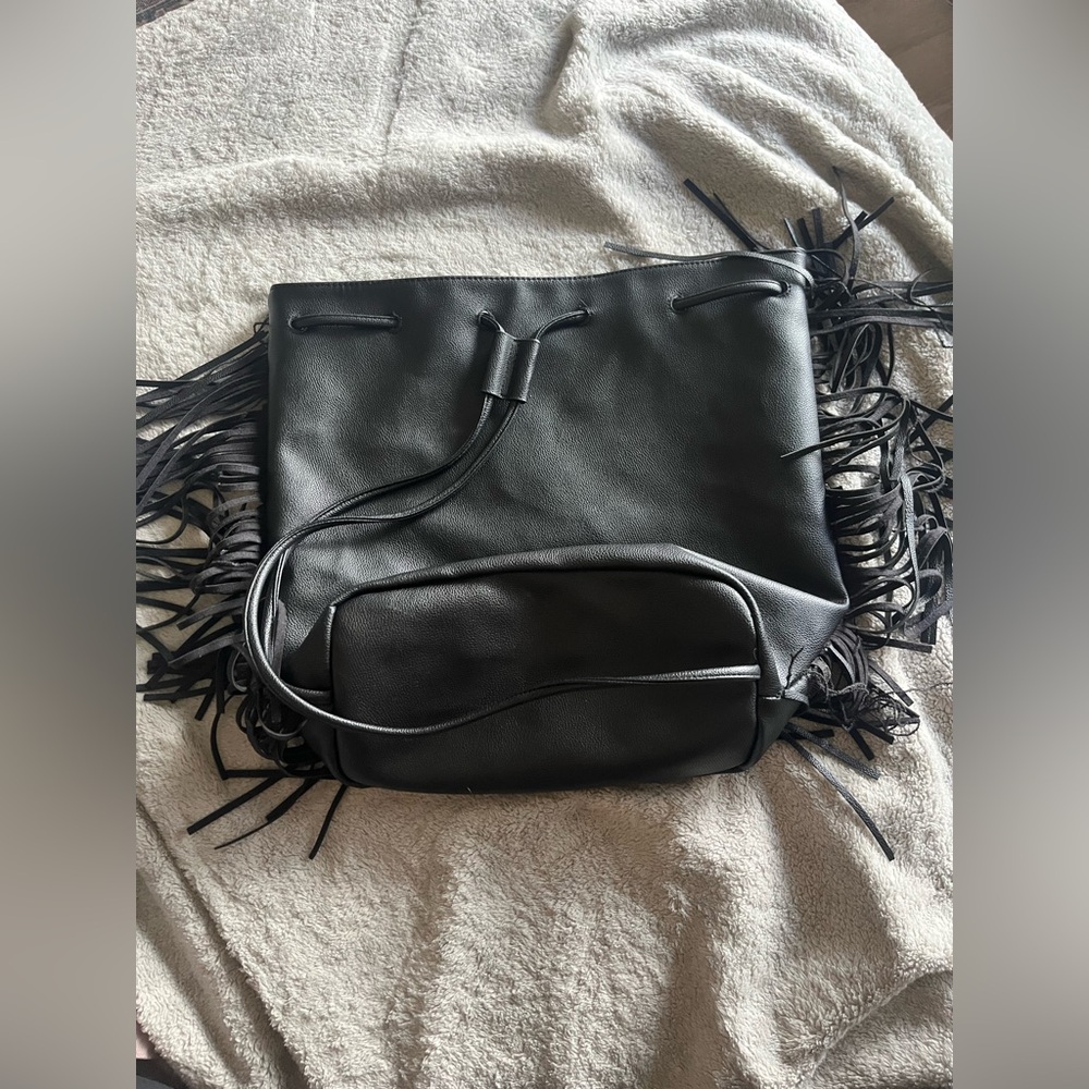 Black fringe faux leather backpack